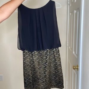 Gold and black beautiful dress.